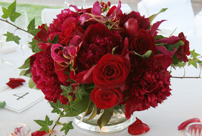 deeo red roses with gloriosa lilies and red peonies
