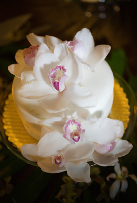 white wedding cake with orchids