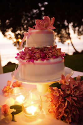 wedding cake with pink orchid center