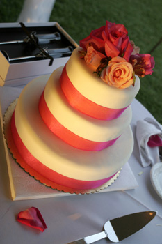 Wedding cake with pink ribbon