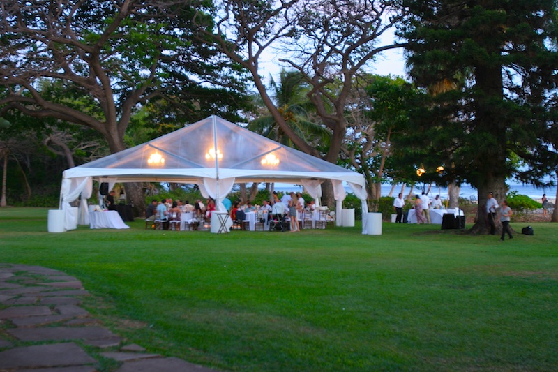 Beatiful lighting in clear top tent for wedding